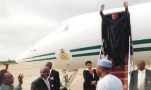 President Goodluck Jonathan  coming out of the plane, at the Asaba International Airport recently. Photo: NAN 