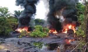 Illegal refineries being destroyed by Naval officers in Warri, recently.