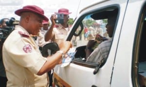 frsc Zonal Commanding Officer in-charge of Edo, Delta and Anambra States, Mr Charles Akpabio, distributing fliers to motorists during the campaign of the  2nd special intervention patrol of the frsc Zone 5 Command in Oraifite, in Ekwusigo lga, Anambra State, recently. Photo: NAN.