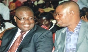Sole Administrator, Rivers State Environmental Sanitation Authority, Mr Ade Adeogun (right) chating with the Director of Administration, Lan Gobo, during a one-day workshop on Environtal Matters for Head Teachers of Public Primary Schools in Port Harcourt, Obio/Akpor, Eleme, Ikwerre, Oyigbo LGAs, yesterday, in Port Harcourt.