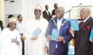 L-R: Founder, Chartered Institute of Bankers of Nigeria, (CIBN), Alhaji Oladimeji Otiti, Oba of Lagos, Obarilwan Akiolu, President, CIBN, Dr Sina Aina and Chairman, First City Monument Bank, Otunba Micheal Balogun, during the unveiling of a Book titled “The Economy of Financial Inclusion in Nigeria” written by Dr Aina in Lagos last Friday.