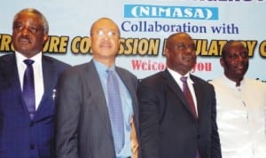  Chairman, Board of Directors, Oil and Gas Free Zone Authority, Mr Chris Asoluka, Guest  Speaker, Prof. Pat Utomi,  representative of Minister of Transport, Mr Oqua  Eta and Director-General,  Nigerian Maritime Administration and Safety Agency (NIMASA), Mr Patrick  Lokemi,  at the National  Workshop on Public-Private Partnership Strategy for Infrastructural Development and Modernisation in the Nigerian Maritime Sector in Lagos last Monday. Photo: NAN