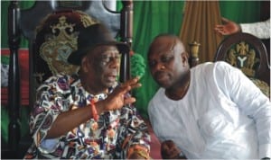 Chairman,Rivers State Council of Traditional Rulers and Gbenemene Tai, King Godwin N.K Gininwa (left), explaining a point to  President General, Ogoni Democratic Movement, Hon Godwin Bazari, during a courtesy visit to his palace, recently.