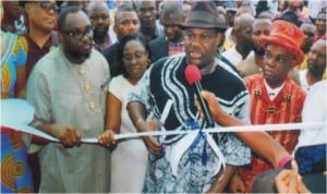 Rivers State Deputy Governor, Engr Tele Ikuru, representing Governor Amaechi cutting the tape to officially commission the Port Harcourt Local Government Council Legislative building. With him are Mayor of Port Harcourt, Chimbeko Akarolo and Eze Victor N Woluchem, Eze Epara Rebisi XII and other dignitaries, during the commissioning, last Tuesday