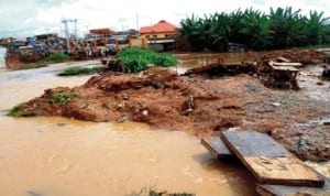 Part of a makeshift bridge at Apete in Ibadan where ten people were suspected to have drowned when the bridge collapsed after a downpour, recently. Photo: NAN