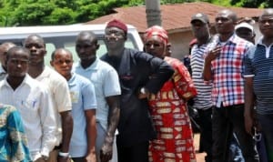 APC governorship candidate, Governor  Kayode Fayemi and his wife Bisi on queue waiting for their turn  to vote  during the governorship election in Ekiti  State recently.