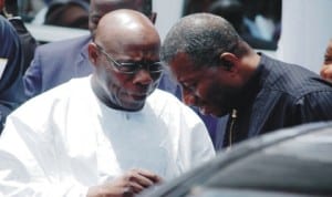 Former President Olusegun Obasanjo (left), discussing with President Goodluck Jonathan at the funeral service of former Lagos Governor, Sir Michael Otedola in Lagos last Friday. Photo: NAN