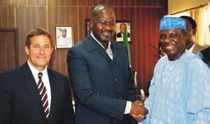  Minister of State for Power, Mr Mohammed Wakil (middle), welcoming the Chairman, Super Solar Nigeria, Prof. Jerry Gana (right), during a courtesy call on the Minister in Abuja  recently. With them is the President, Dacc Alternative Energy Company, Usa, Mr Melon Douglas. Photo: NAN