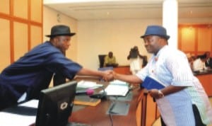 Governor of Rivers State, Rt Hon Chibuike Amaechi (left), congratulating the Chairman, Caretaker Committee of Emohua Local Government Area, Hon Godstime Orlukwu, during his swearing-in at Government House, Port Harcourt, last Saturday. 