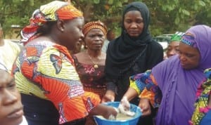 Women preparing food during a practical session on processing food for school feeding and family nourishment organised by the Federal Ministry of Agriculture in Gombe.