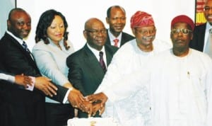 L-R: President, Pearl Awards Nigeria, Mr Tayo Orekoya, chairman, Investment and Securities Tribunal, Mrs Ngozi Chianakwalam, chairman of the occasion, Dr Kalu Idika Kalu, Special Adviser, Pearl Awards Nigeria, Chief Alex Akinyele and Chairman, Pearl Awards Board of Governors, Alhaji Umar Abdullahi, cutting a cake, during the 10th annual Pearl Awards Public Lecture forCapital Market Development in Lagos, recently. Photo: NAN