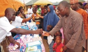  Naval medical personnel dispensing drugs to people, during the Medical Rhapsody to commemorate 58th  anniversary of Nigerian Navy at Mpape in Abuja, recently. Photo: NAN