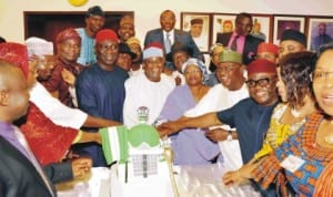 Senators cutting cake with Senate President David Mark (middle) to end the 3rd session of the 7th Senate at the National Assembly in Abuja, yesterday. Photo: NAN