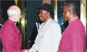 President Goodluck Jonathan (middle), welcoming the Archbishop of Canterbury, Rt. Rev. Justin Welby, during his visit to the Presidential Villa in Abuja last Wednesday. With them is the Primate of the Anglican Communion, Most Rev. Nicholas Okoh. Photo: NAN