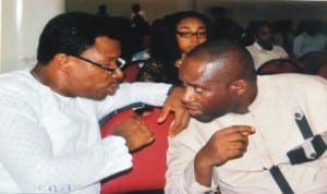 Hon Levi Gogo Charles, (left) Commissioner for Budget and Economic Planning disscussing with Mr Kelicous Amos, Project Cordinator SEEFOR project at an orientation programme for youths engaged in public works (road maintenace) at the Ministry of Justice conference hall recently. Photo: Prince Dele Obinna