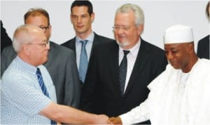 Permanent Secretary, Ministry of Works, Dr Abubakar Muhammad (right), welcoming the Chief Executive Officer, Dem Group, Mr Graham Lowe, to a Nigeria-Belgium Investment Forum in Abuja last Friday.  With them are leader of the Belgium delegation, Mr Marc Van Peel (2nd-right) and Head of Mission, Embassy of the Kingdom of Belgium, Mr Xavier Baert.