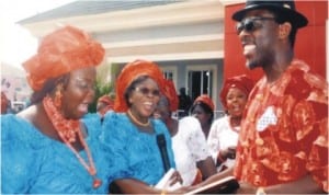 President General, Bonny Women Patriotic Movement, Amb Nne Furo Kurubo (middle), presenting an Award of Excellence to member representing Bonny Constituency in the Rivers State House of Assembly, Hon Aye Pepple. during the commissioning/handover ceremony of Bonny Women Hall in Bonny, last Saturday.  With them is Vice President, Bonny Women Patriotic Movement, Hon Lady Rosannah Igoni (left). Photo: Egberi Sampson 