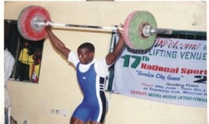  A weightlifter showing off his talent in past meeting.