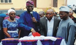 Wife of   Late Human Rights Activist, Dr Yewande Cole-Ajibola, Governor Babatunde Fashola of  Lagos State, Commissioner for Housing, Mr Bosun Jeje and Commissioner for Finance, Mr Ayo Gbeleyi, at the inauguration of Gbagada Housing Estate in Lagos recently.