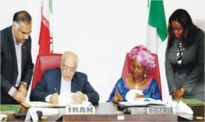 Iranian Minister of Industry, Mines and Trade/Head of Iranian delegation, Mr Mohammad Nemaizadeh (left) and Minister of State (1) for Foreign Affairs, Prof. Viola Onwuliri, signing Memorandum of Understanding on Tourism, Geology, Mining, Mineral Processing and Industrial Cooperation at the 5th Nigeria-Iran Joint Commission meeting in Abuja, yesterday.