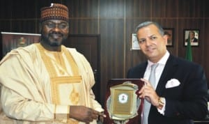 Minister of State for Power, Mr Mohammed Wakil (left), with the Leader of Investors from the United States, Mr Ron Yefeez, during their visit to the Minister in Abuja, last Monday. Photo:NAN 