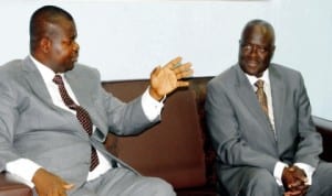 Managing Director, News Agency of Nigeria (NAN), Mr Ima Niboro (left), with the Chairman, Subsidy Re-investment and Empowerment Programme (SURE-P), Retired Gen. Martin Agwai, during his visit to NAN headquarters in Abuja last Wednesday. Photo: NAN