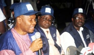 L-R: Returning officer for Ekiti State governorship election, Prof. Isaac Asuzu, Resident Electoral Commissioner for Ekiti State, Alhaji Halilu Pai  and National Commissioner of  INEC, Dr Chris Iyimoga, during the release of final results for Ekiti State governorship election in Ado-Ekiti last Sunday.