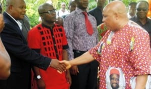 National Chairman, APGA Board of Trustees, Chief Martins Agbaso (right) exchanging pleasantries with his campaign team in Owerri recently. Photo: NAN