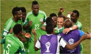 Super Eagles players celebrating with playmaker, Osaze Odemwingie (middle) after he scored Nigeria’s goal that effectively eliminated Bosnia-Herzegovina from the World Cup finals last Saturday night in Brazil