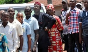 APC governorship candidate, Governor Kayode Fayemi (5th left), and his wife Bisi on queue waiting for their turn to vote at Unit 9, Ward 13 in Isan,during the governorship election in Ekiti State, last Saturday.