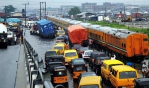 Traffic on Apapa road following an early morning rainfall in Lagos last Friday. Photo: NAN