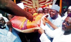  Nigeria's Ambassador to Morocco, Senator Abdallah Wali (right), presenting N60m worth of rice to Sokoto State in Sokoto last Tuesday. Photo: NAN
