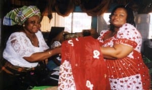 Member, House of Representatives representing Port Harcourt Constituency III, Hon. Mrs. Blessing Nsiegbe (right), presenting a gift to the Chairperson of Rumuwoji Women Forum, Mrs Gloria I. Amadi, during her constituency’s empowerment programme in Port Harcourt last Monday. Photo: Obinna Prince Dele
