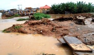 Part of  Amakeshift Bridge at Apete in Ibadan where ten people were suspected to have drowned when the bridge collapsed after a downpour recently.