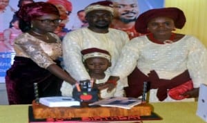 Dr Alpheaus Paul-Worika and family cutting his Birthday Cake, last Sunday