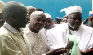 L-R: Ekiti State Deputy Governor-elect, Dr Olusola Eleka, Director-General, Ayo Fayose Campaign Organisation (AFCO), Chief Dipo Anisulowo and  Ekiti State Chief Imam, Alhaji Jamiu Kewulere, during the presentation of bags of rice to Ekiti Muslim faithful for Ramadan at Ado-Ekiti Central Mosque, recently.