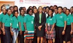 Minister of Communication Technology, Mrs Omobola Johnson (middle), with some girls undergoing Ict training at the 1000 Girls Ict Training Programme of the Ministry in Abuja last Tuesday. Photo: NAN