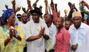 Sen. Magnus Abe flanked by State APC women leader, Caroline Nagbo and former Dep. Leader, Oyigbo Legislative  Assembly, Ernest Nwogu (1st right), dancing shortly after admitting over 250 defected PDP members in Oyigbo LGA to APC at the Council Secretariat, Afam.