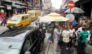 Commercial activities peaking at Balogun Market in Lagos State after Eid-el-Fitr holidays recently.