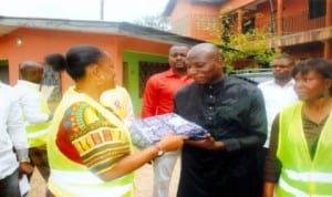Member, House of Representatives for Port Harcourt Constituency 2, Hon. Blessing Nsiegbe represented by Mrs Doris Ejegwu (left), presenting a gift to Alhaji Aribiton Okiri on behalf of Muslim women during the Sallah celebration in Port Harcourt last Wednesday. Photo: Obinna Prince Dele