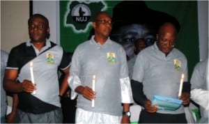 National President, Nigeria Union of Journalists (NUJ), Garba Mohammed (middle) flanked by Mr Paulinus Nsirim (left) and the National Secretary NUJ, Mr Shuiabu Usman Leman at the night of tributes for late Mr Ndagene Akwu, former president of the union in Port Port Harcourt, yesterday
