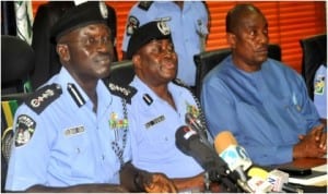 Acting IGP, Suleiman Abba (left), addressing senior police officers in Abuja last Friday.With him are AIG Force Headquarters, Mr Dan Azumi Dona (middle) and AIG Intelligence Bureau, Mr Solomon Arase. 