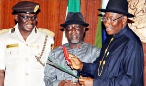 L-R: Comptroller-General of Immigration, David Parradang, Minister of Interior, Comrade Abba Moro and President Goodluck Jonathan, during the launch of  new e-Passport at the Federal Executive Council meeting in Abuja, recently.