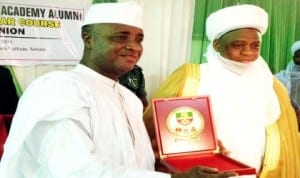 Governor Aliyu Wamakko of Sokoto (left), receiving a souvenir from Sultan of Sokoto, Alhaji Sa'ad Abubakar 111 for attending the Nigerian Defence Academy Alumni 18th Regular Course Re-union in Sokoto, recently.