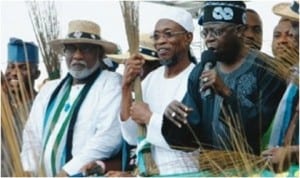 National Leader of All Progressives Congress (APC), Senator Bola Ahmed Tinubu ( right), Governor of Osun State,Ogbni Rauf Aregbesola (2nd right) and another party elder at the APC mega rally yesterday in Oshogbo ahead of the governors election in the state on Saturday