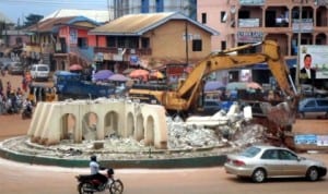 Demolition of Arroma Roundabout, Awka, on the Enugu -Onitsha expressway, recently. 