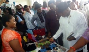 PHCCIMA President, Engr Emeka Unachukwu (2nd right), with Rivers State Commissioner for Youth Development, Sir Owene Wonodi, inspecting crafts and other products made by youths of the state under the sponsorship of the Ministry, in Port Harcourt, recently.