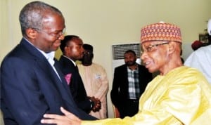 Governor Babatunde Fashola of Lagos State (left), with former Chief Justice of Nigeria, Justice Dahiru Musdapha, at the inter-faith Conference  in Abuja, yesterday.