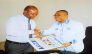  General Manager, Rivers State Newspaper Corporation (RSNC), Mr Celestine Ogolo (right),  with  Chairman, Nigeria Hotels Association, Rivers State chapter, Mr Eugene Nwauzi  receiving copies of The Tide Newspapers, during the association’s visit to the corporation in Port Harcourt recently. Photo: Obinna Prince Dele