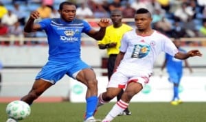 Enyimba (left), player trying to outsmart an opponent durijng a Premier League match in Aba, Abia State, recently.